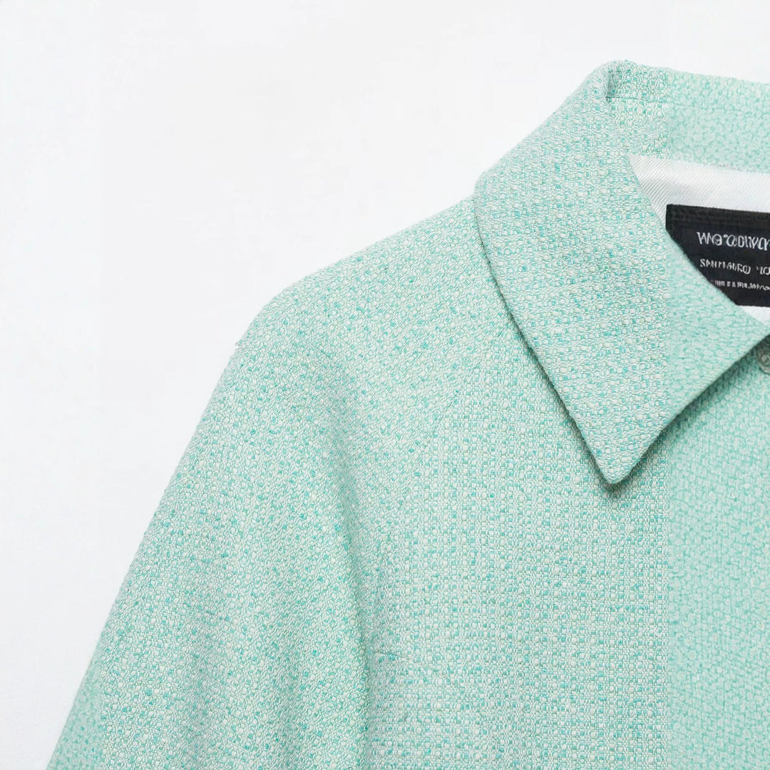 Damen Kurzblouson aus Bouclé mit verdecktem Reißverschluss und Umschlagmanschetten Nord Taschen