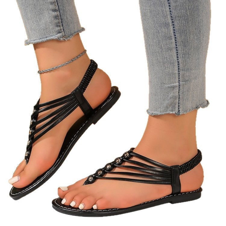 Damen modische und luftige Zehentrenner-Sandalen mit dekorativen Riemen