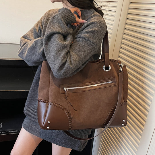 Damen elegante Handtasche mit offenen Seiten und dezenten Lederdetails Nord Taschen
