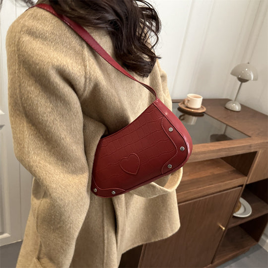 Damen Umhängetasche mit Herzmotiv und strukturierter Oberfläche Nord Taschen