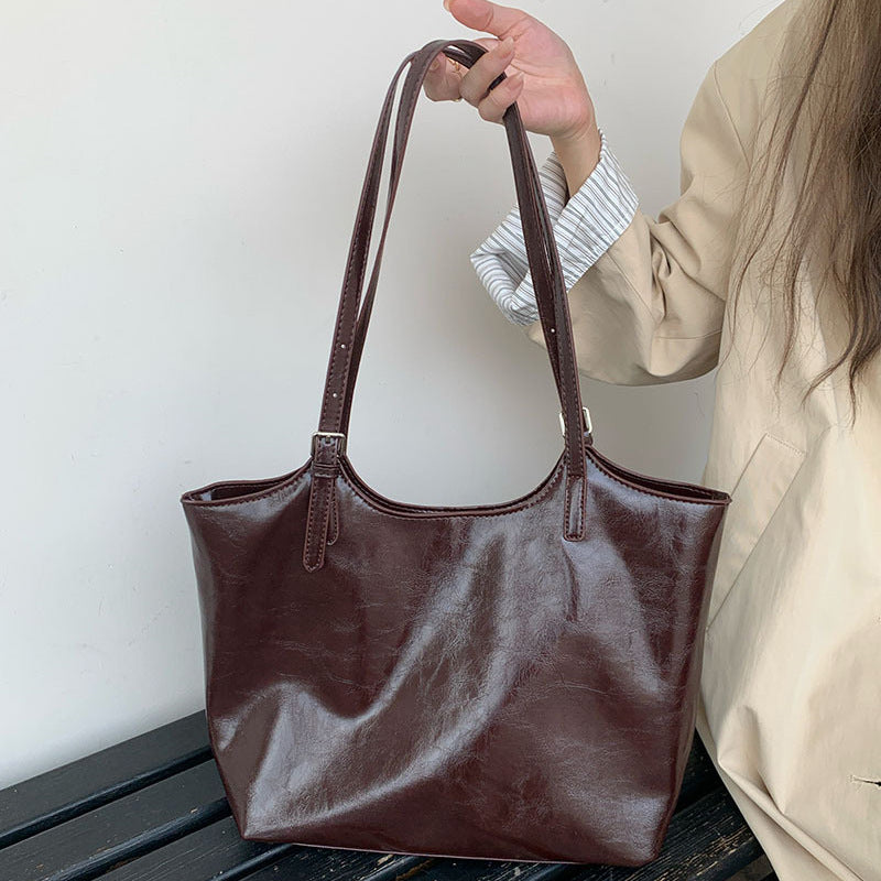 Damen elegante Tragetasche mit geschwungenem Design Nord Taschen