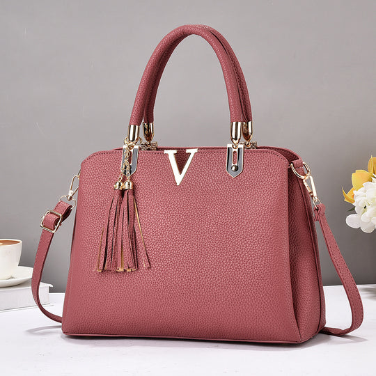 Damen Designer-Handtasche mit eleganter Quaste und abnehmbaren Schulterriemen Nord Taschen