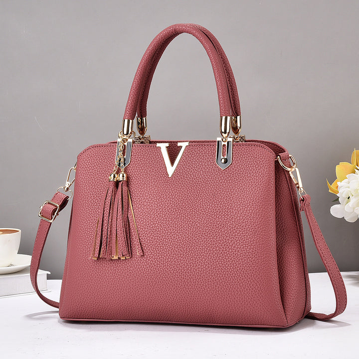 Damen Designer-Handtasche mit eleganter Quaste und abnehmbaren Schulterriemen Nord Taschen