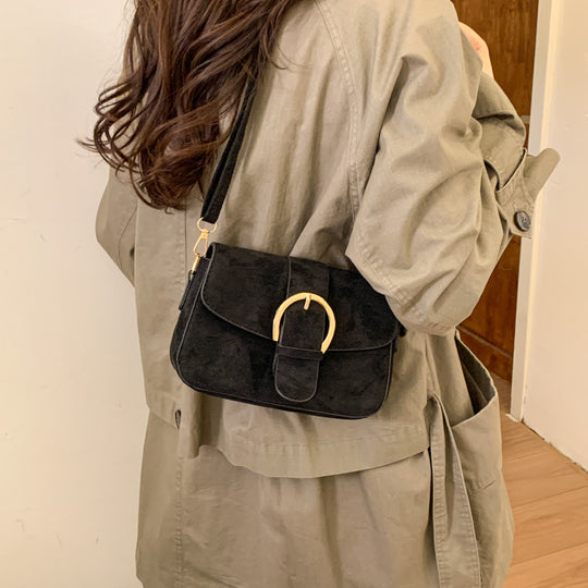 Damen elegante Umhängetasche mit stylischen goldenen Akzenten Nord Taschen