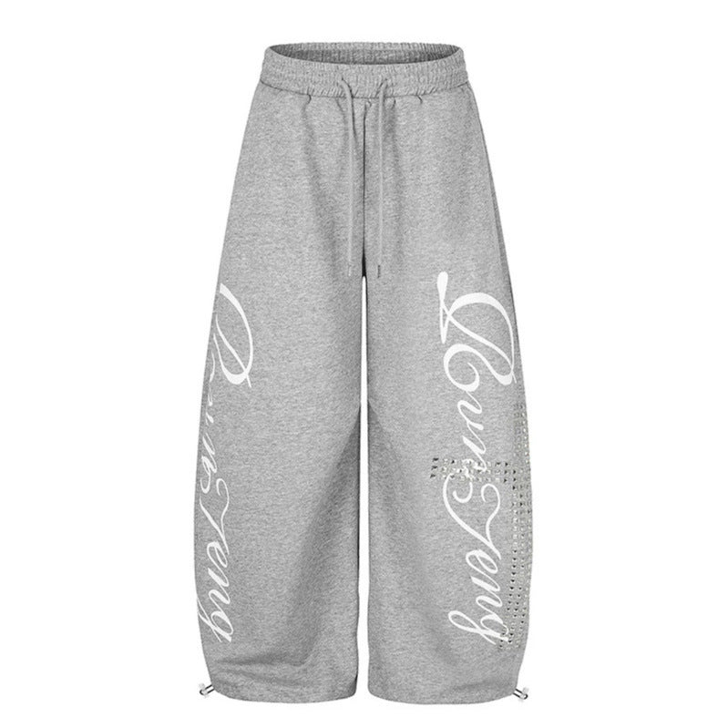Damen Palazzo-Sweatpants im Culotte-Stil mit hohem Bund, Tunnelzug, Schriftprint und Strassbesatz Nord Taschen