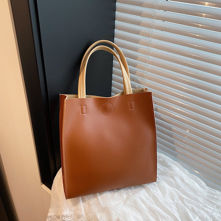 Damen elegante Handtasche mit strukturiertem Design und abnehmbaren Tragehenkeln Nord Taschen