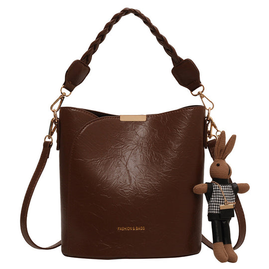 Damen Schultertasche aus hochwertigem Kunstleder mit geflochtenem Detail Nord Taschen
