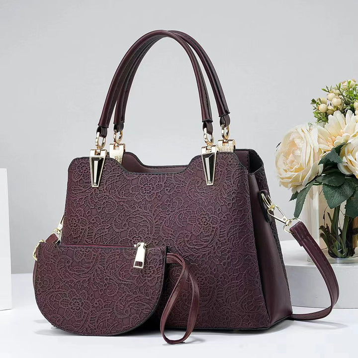 Damen elegante Handtasche mit filigranem Spitzenmuster und abnehmbarer Clutch Nord Taschen