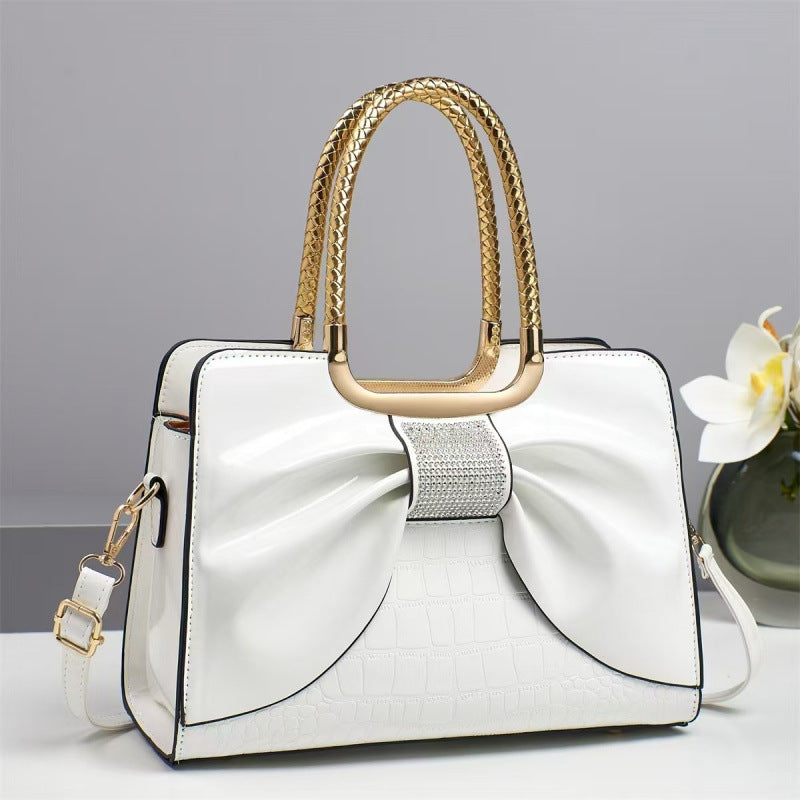 Damen Designer-Handtasche mit schimmerndem Schleifenakzent Nord Taschen