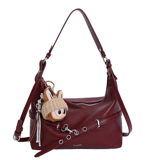 Damen modische Hobo-Tasche aus hochwertigem Kunstleder mit verspieltem Anhänger Nord Taschen