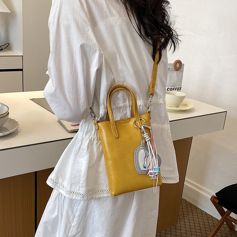 Damen Mini-Handtasche mit elegantem Anhänger Nord Taschen