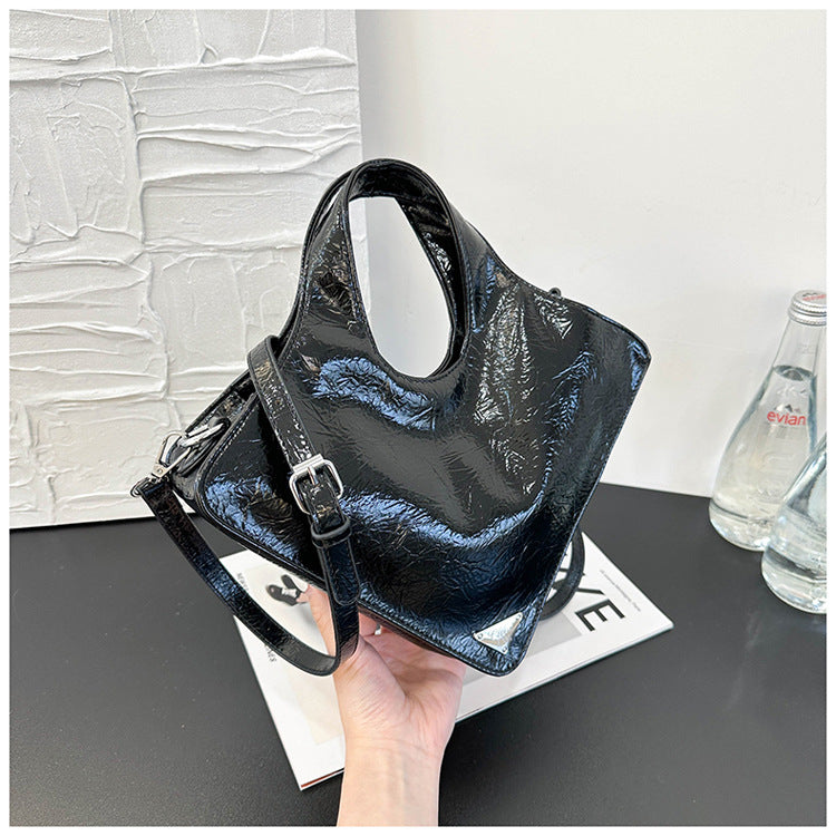 Damen stilvolle Handtasche aus glänzendem Kunstleder Nord Taschen