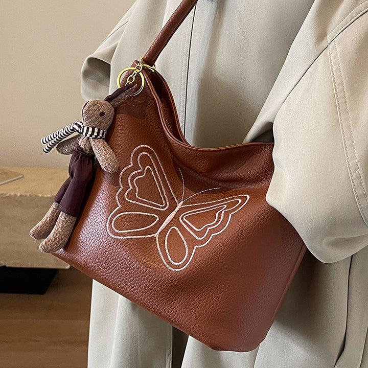 Damen Umhängetasche mit exklusivem Schmetterlingsdesign Nord Taschen