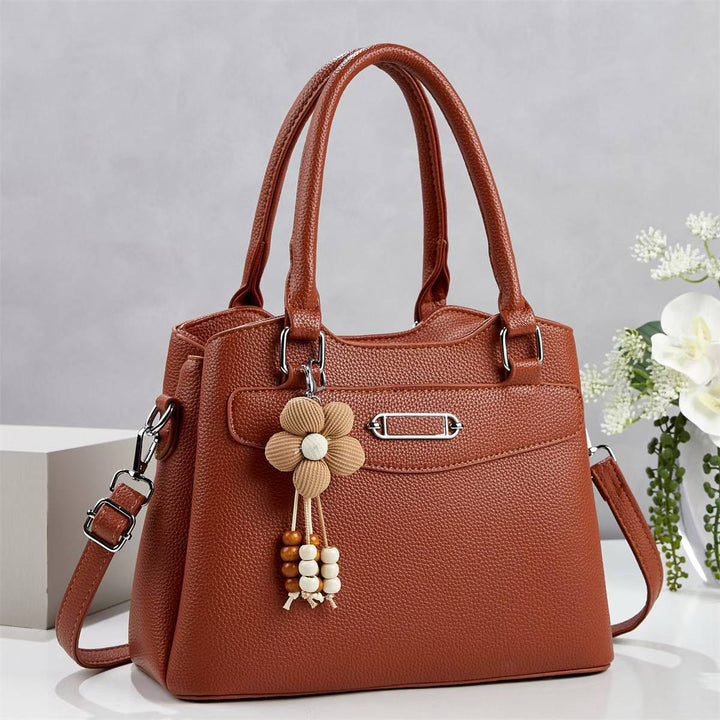 Damen elegante Handtasche mit abnehmbarem Blumen-Anhänger Nord Taschen