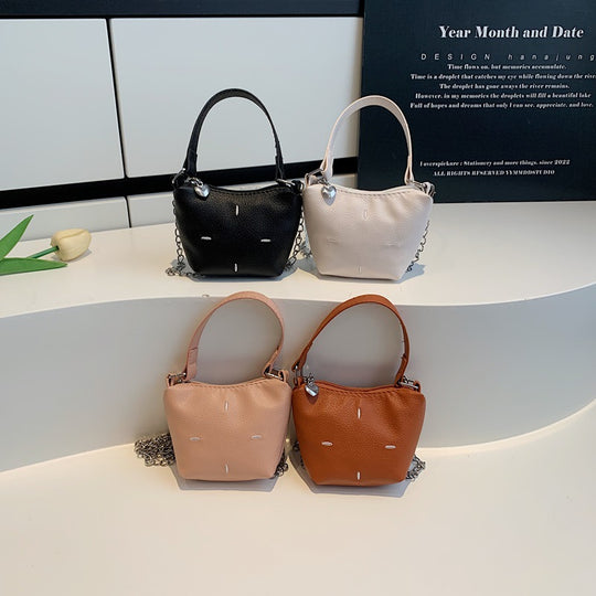 Damen Mini-Handtasche mit glänzender Kette und strukturiertem Obermaterial Nord Taschen