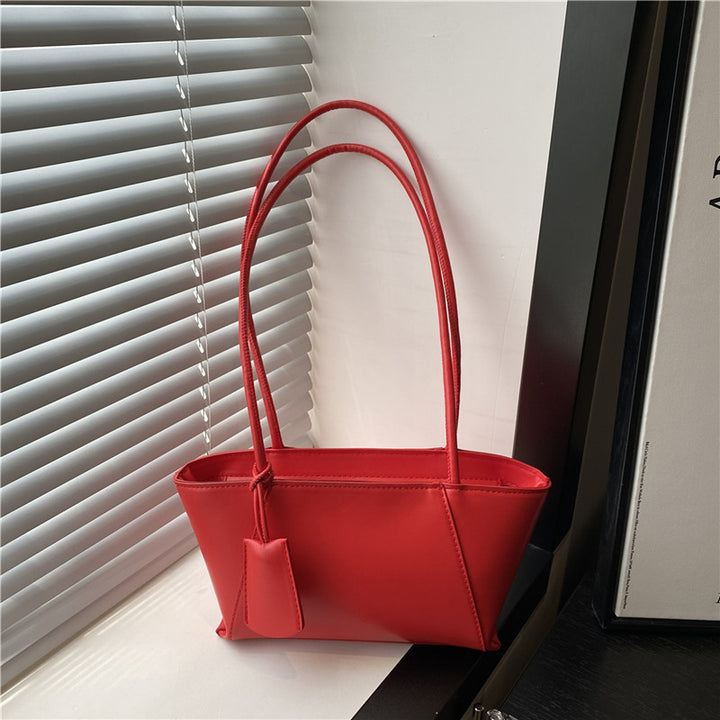Damenhandtasche mit minimalistischer Silhouette und eleganten Details Nord Taschen