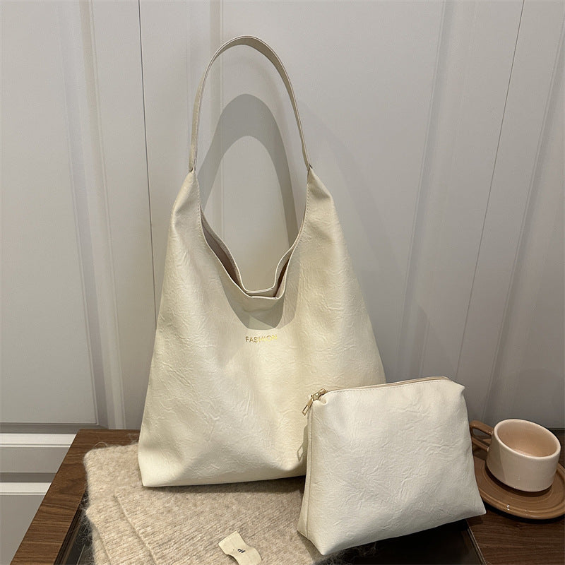 Damen elegante Umhängetasche aus kunstleder mit einer passenden Kosmetiktasche Nord Taschen