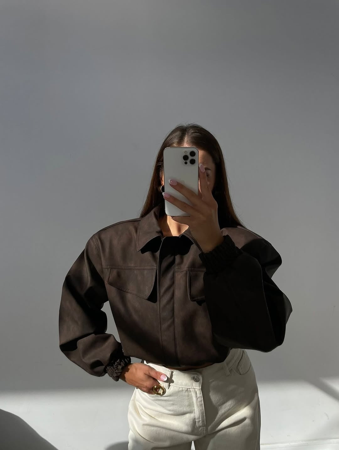 Damen Kurz geschnittene Kunstlederjacke mit aufgesetzten Brusttaschen Nord Taschen