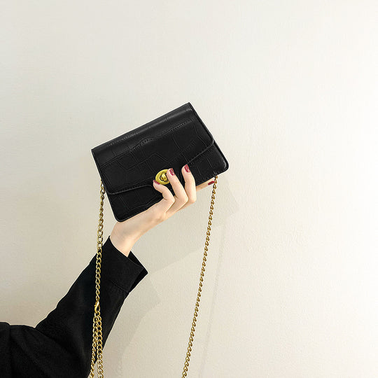 Damen Crossbody Clutch mit eleganter Kettenapplikation Nord Taschen