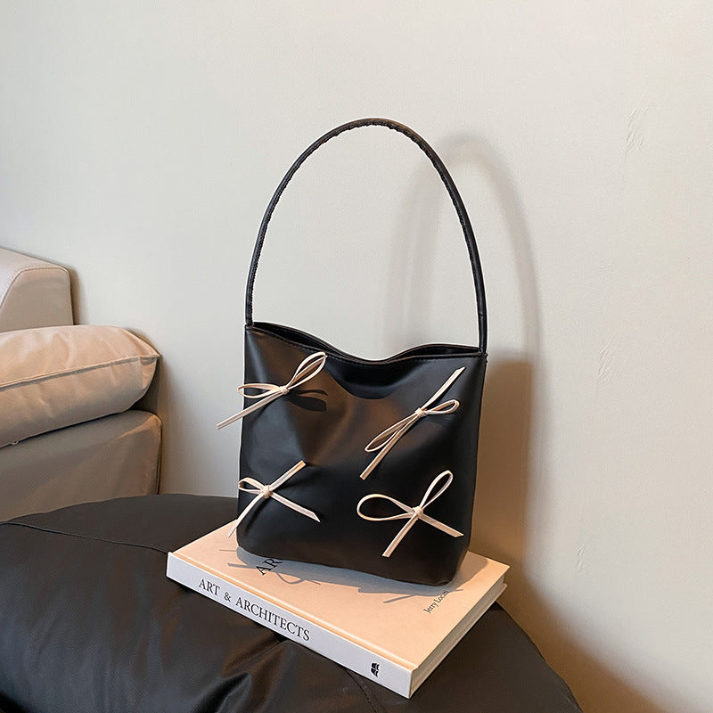 Damen Henkeltasche mit dekorativen Schleifendetails Nord Taschen