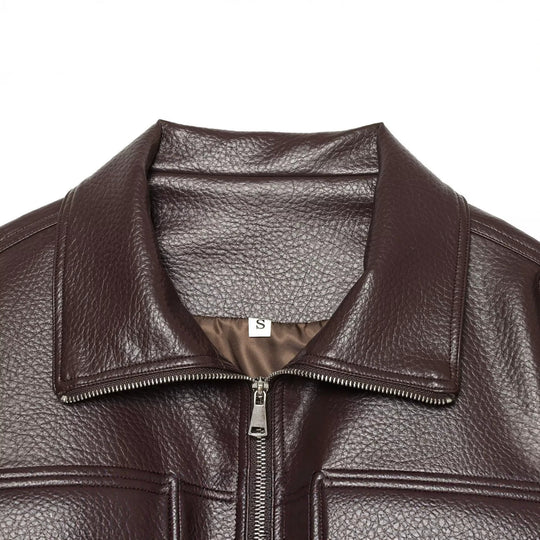 Damen Kurzblouson aus geprägtem Kunstleder mit Tunnelzug‑Taillierung und Pattentaschen Nord Taschen