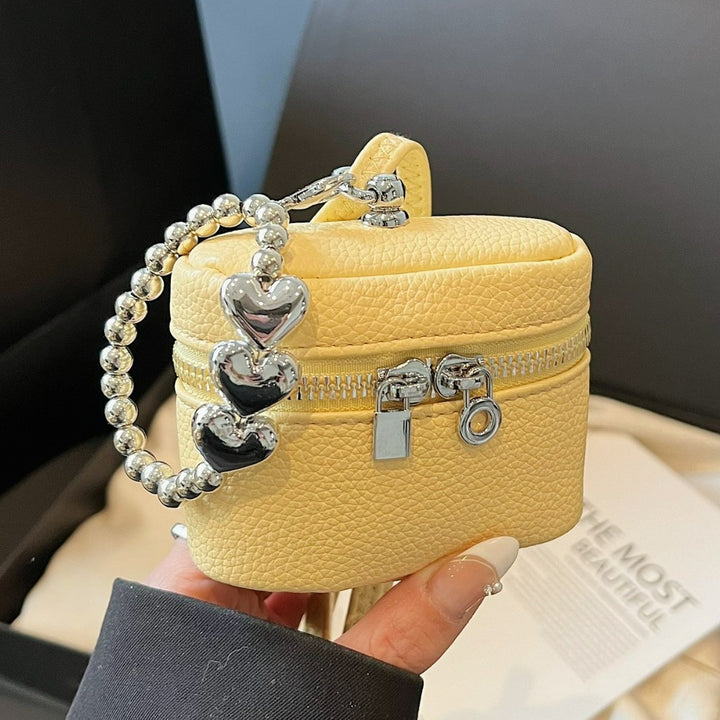 Damen Mini Umhängetasche mit dekorativem Herzanhänger Nord Taschen