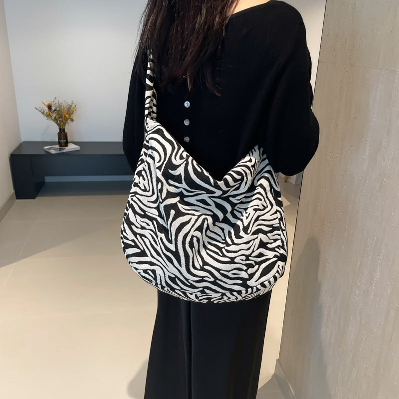 Damen trendy Beuteltasche im Zebra-Design Nord Taschen