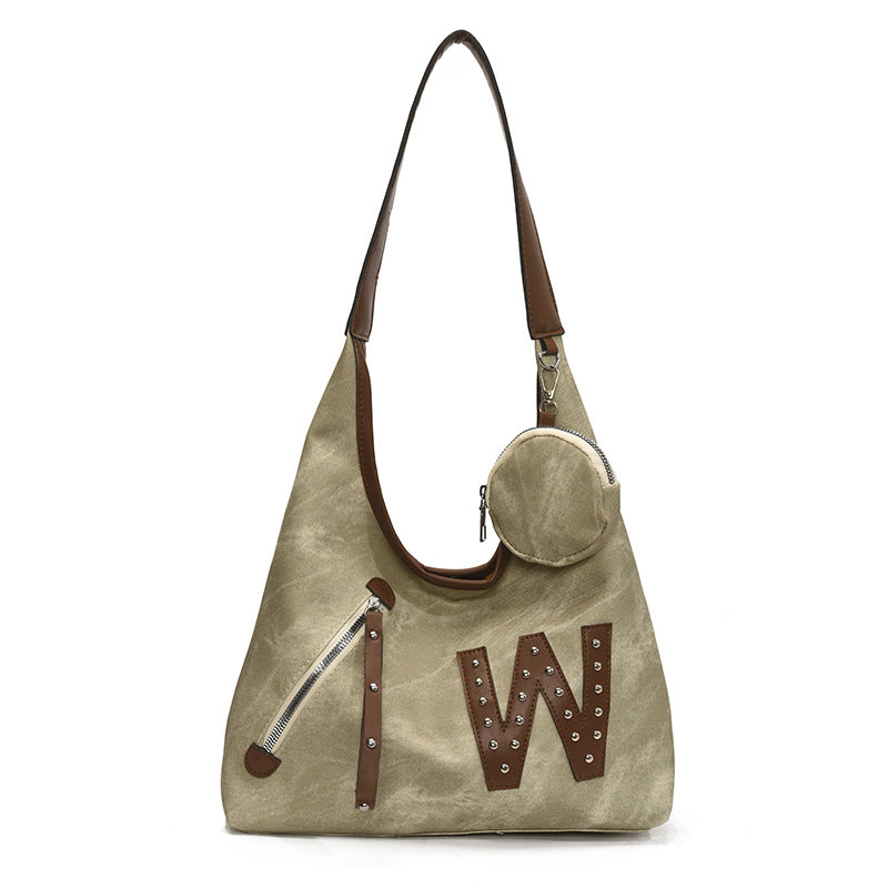 Damen Handtasche mit dekorativem Anhänger und praktischen Fächern Nord Taschen