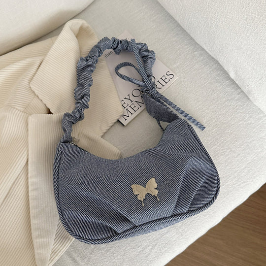Damen Handtasche mit kreativer Faltentechnik und verspieltem Trageriemen Nord Taschen