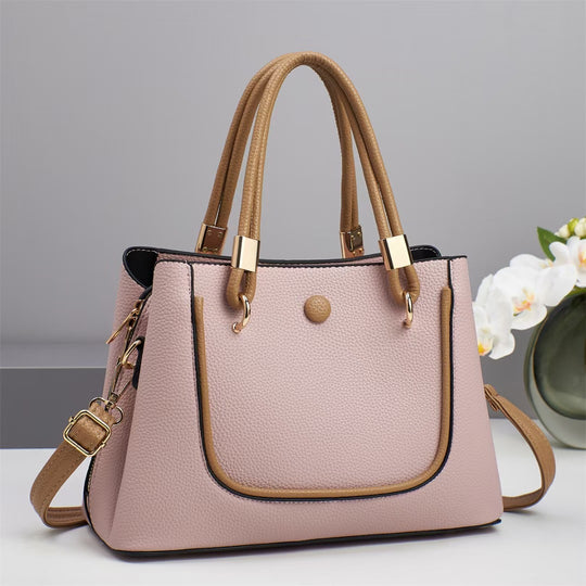 Damen Handtasche mit goldenen Akzenten und eleganter Struktur Nord Taschen