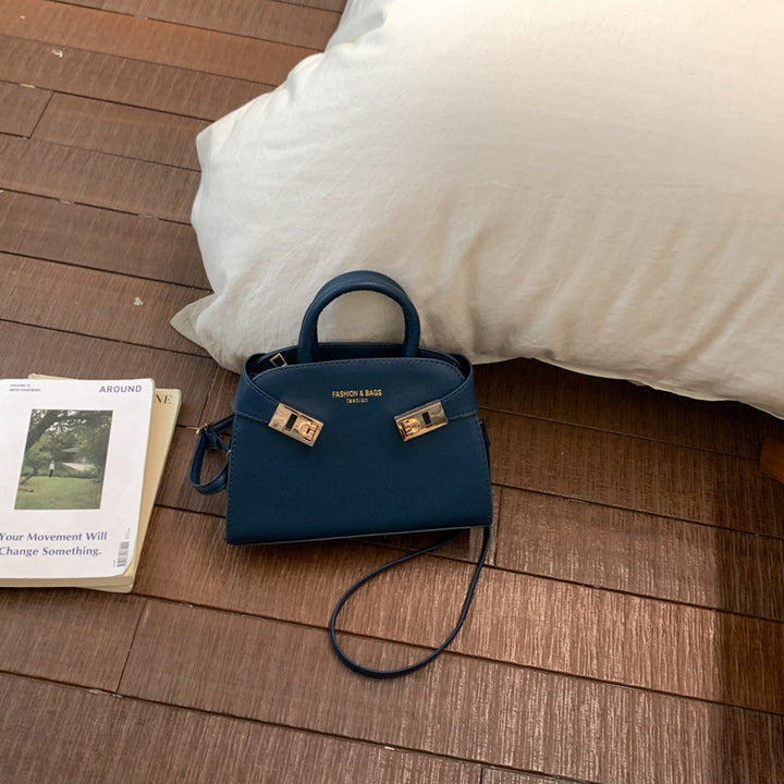 Damen elegante Handtasche mit verspieltem Verschluss Nord Taschen