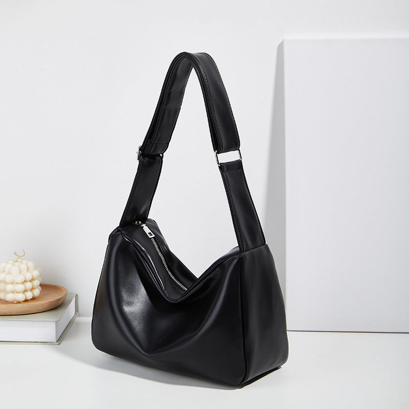 Damen Umhängetasche aus hochwertigem Kunstleder mit innovativem Faltendesign Nord Taschen