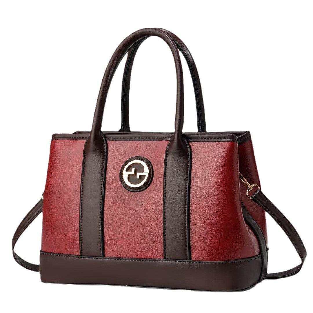 Damen elegante Handtasche mit glänzenden Akzenten Nord Taschen