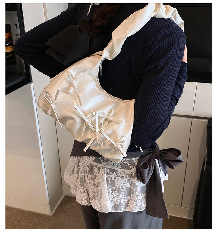 Damen Handtasche mit raffinierten Schleifen-Details und elegantem Tragegriff Nord Taschen