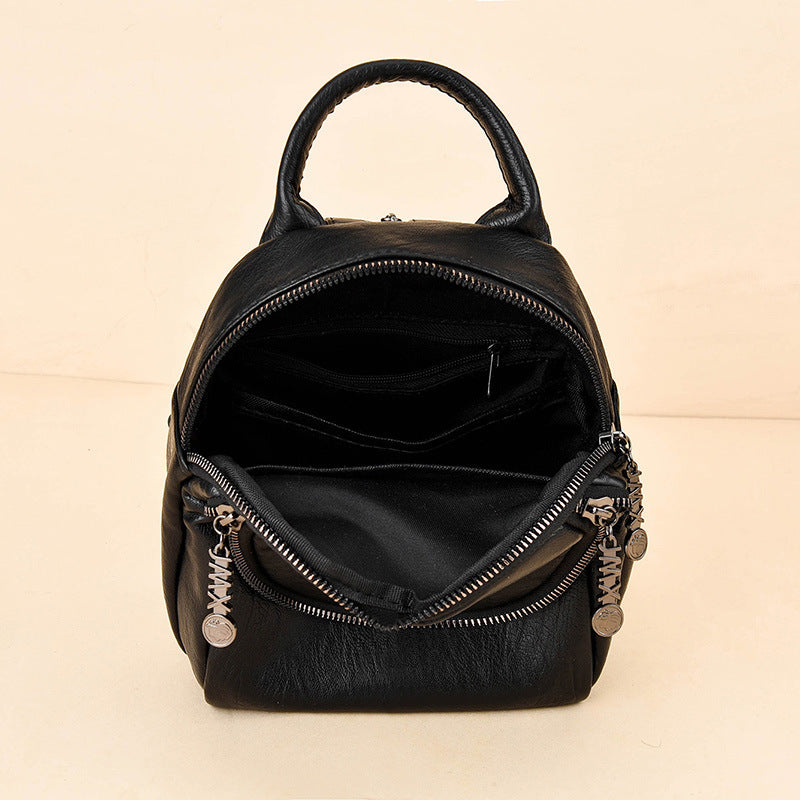 Damen Rucksackhandtasche mit kunstvollem Flechtmuster und praktischen Fächern Nord Taschen