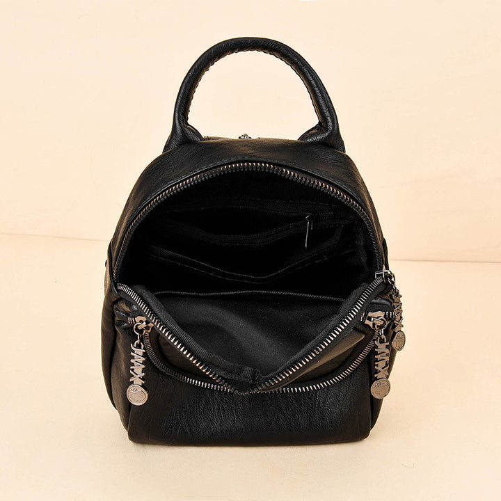 Damen Rucksackhandtasche mit kunstvollem Flechtmuster und praktischen Fächern Nord Taschen
