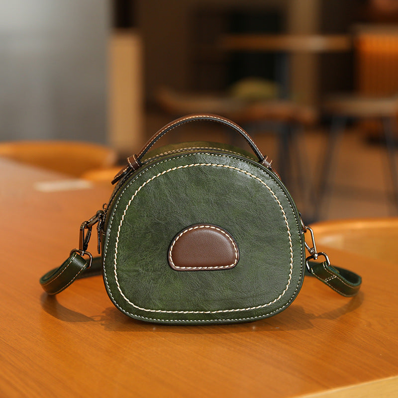 Damen Designer Handtasche mit modernem Rundschnitt und hochwertiger Lederverarbeitung Nord Taschen