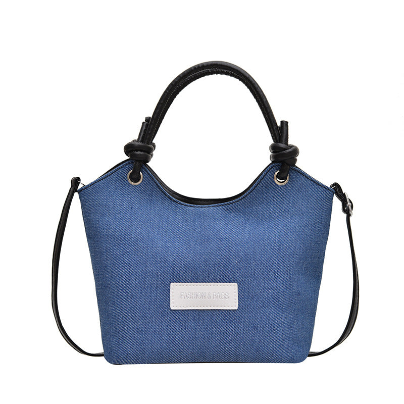 Damen Handtasche aus strapazierfähigem Denim mit eleganten Lederdetails Nord Taschen
