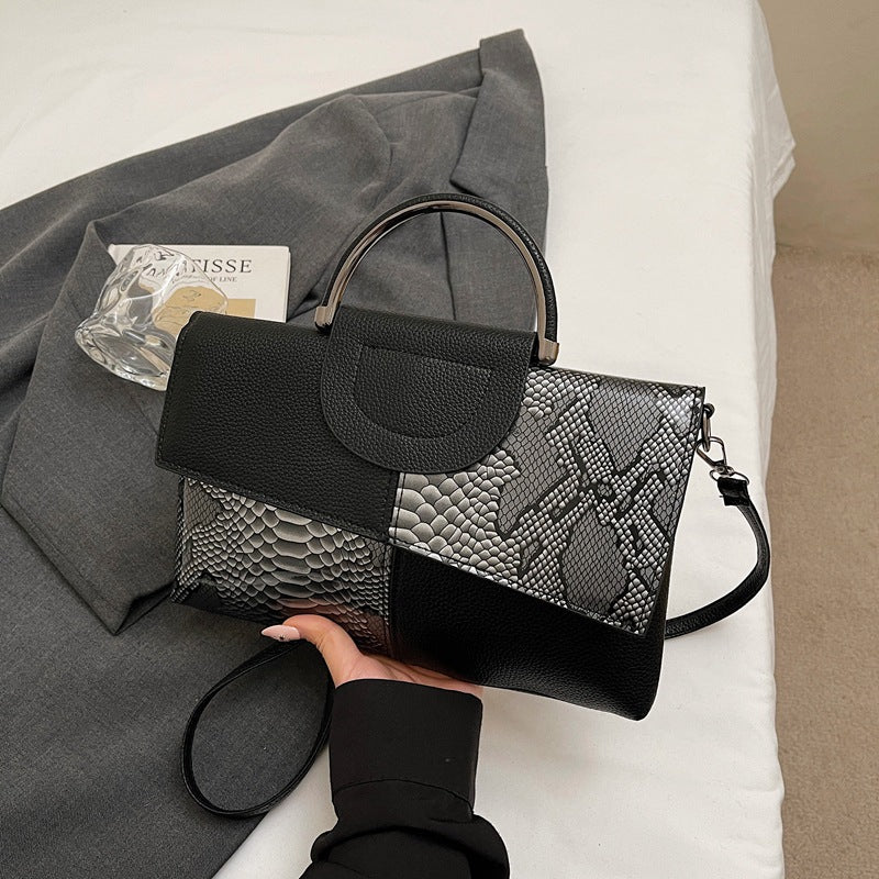 Damen elegante Umhängetasche im modernen Schlangenleder-Look Nord Taschen