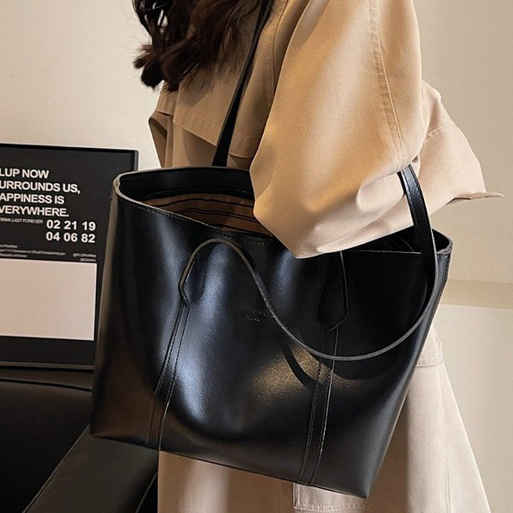 Damen elegante Tragetasche mit minimalistischer Silhouette Nord Taschen