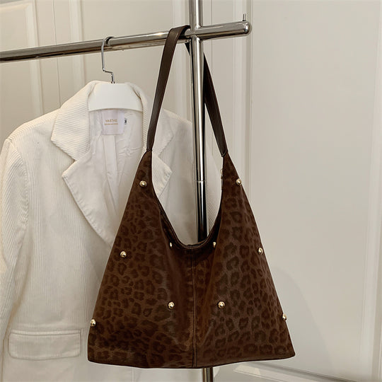 Damen Hobo-Tasche mit elegantem Leopardenmuster und goldenen Akzenten Nord Taschen