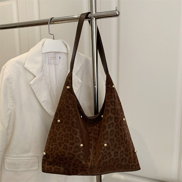 Damen Hobo-Tasche mit elegantem Leopardenmuster und goldenen Akzenten Nord Taschen