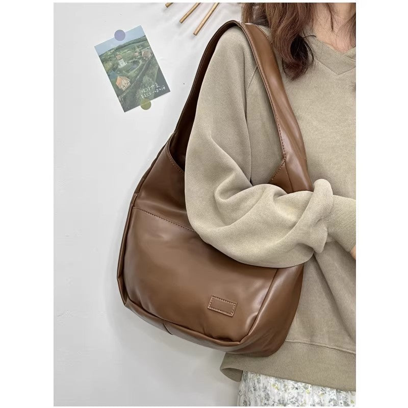 Damen Hobo-Tasche mit eleganter Form und praktischem Tragegriff Nord Taschen