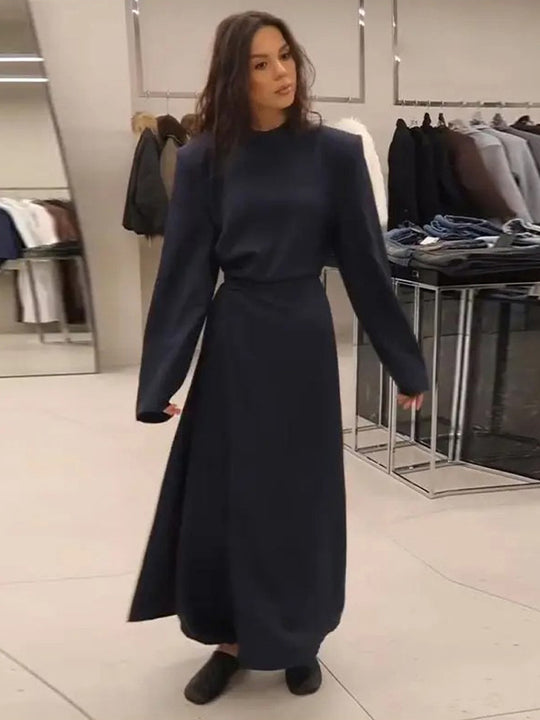 Damen Maxikleid mit taillierter Silhouette, ausgestelltem Rock und markanten Schultern Nord Taschen