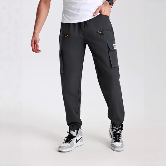 Herren konisch geschnittene Utility-Cargohose im Joggerstil mit Tunnelzugbund, Reißverschlusstaschen & elastischen Beinabschlüssen Nord Taschen