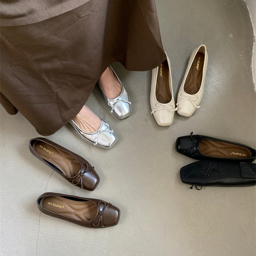 Damen klassisch geschnittene Ballerinas mit zierlichem Schleifenakzent und komfortabler Fußbettung