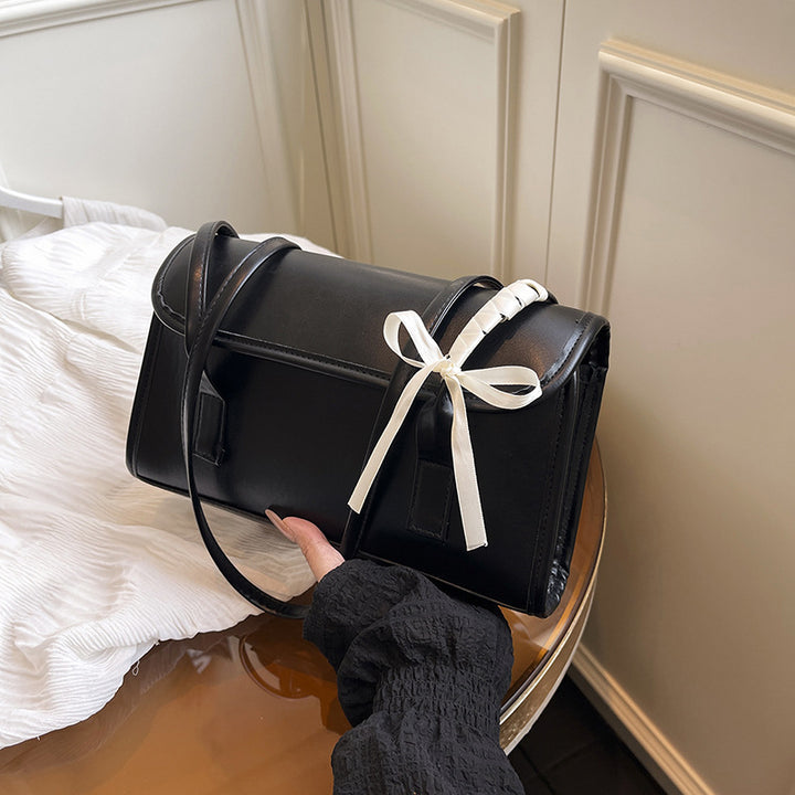 Damen Handtasche aus hochwertigem Kunstleder mit verspieltem Schleifendetail Nord Taschen