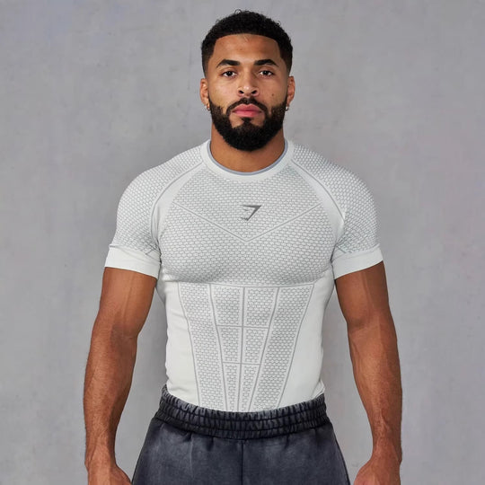 Herren nan muskelmodellierendes Funktionsshirt mit 3D-Struktur und gezielten Kompressionszonen Nord Taschen