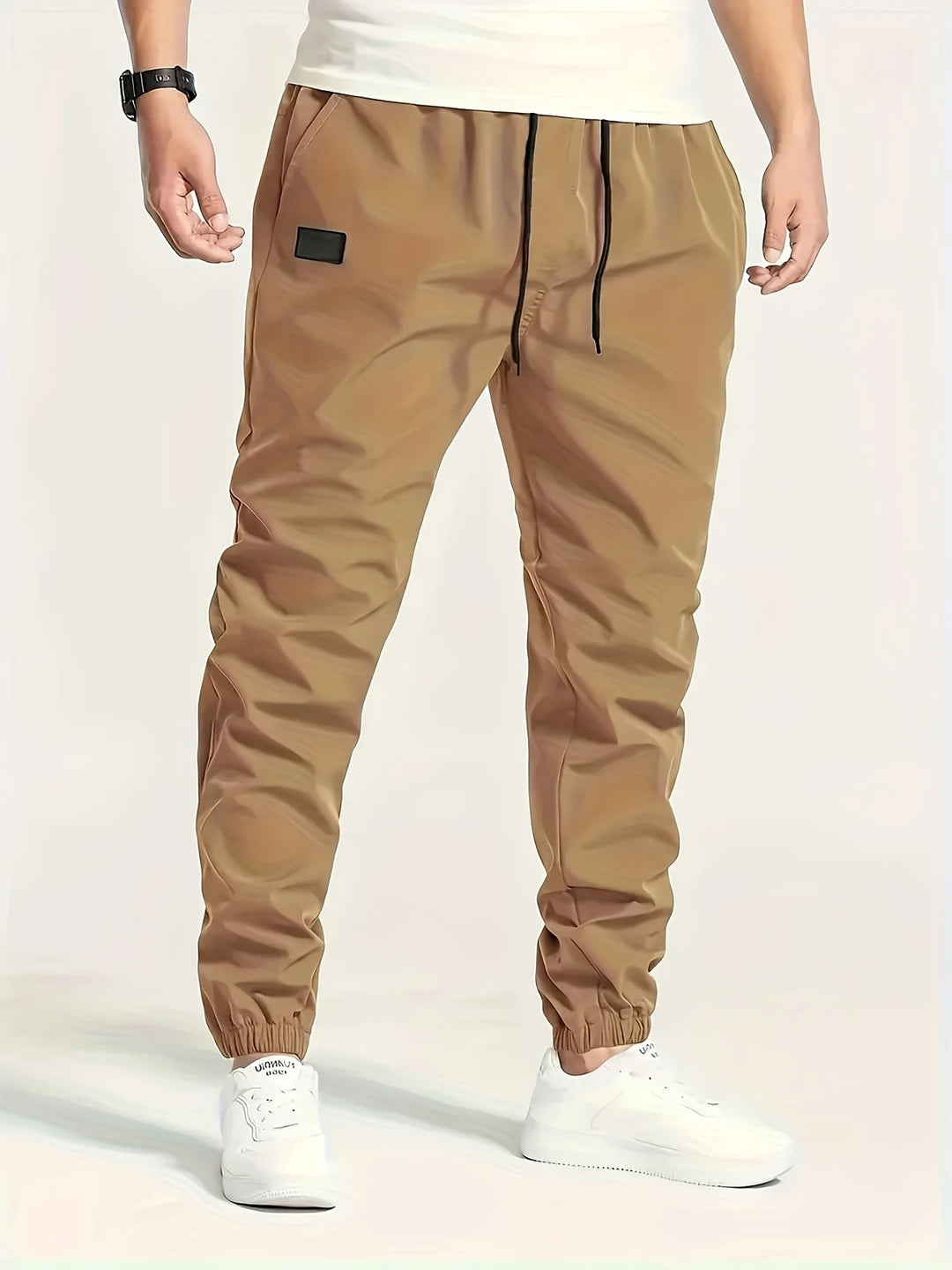 Herren Technische Jogginghose im Tapered‑Utility‑Stil mit elastischem Bund & Knöchelbündchen Nord Taschen