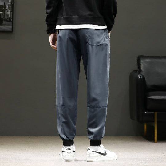 Herren Sportive Jogginghose im Trackstyle mit seitlichen Kontraststreifen, Tunnelzug und elastischen Bündchen Nord Taschen